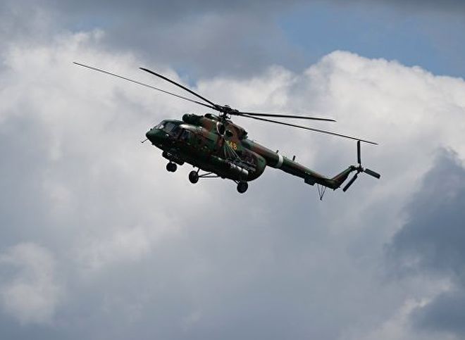 На месте крушения вертолета Ми-8 найдены двое выживших