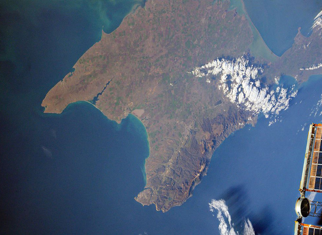 Российский космонавт показал фото моста в Крым с борта МКС